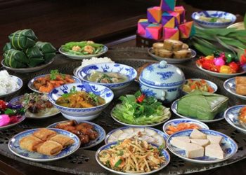 Vì sao mâm cỗ Tết luôn phải có bánh chưng, thịt mỡ, dưa hành?