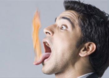 Bị nhiệt miệng trong ngày lễ tết, ăn uống nhiều phải làm sao?